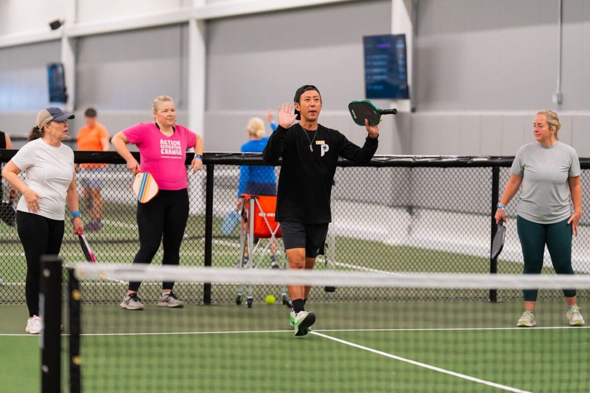 coach AJ teaching pickleball